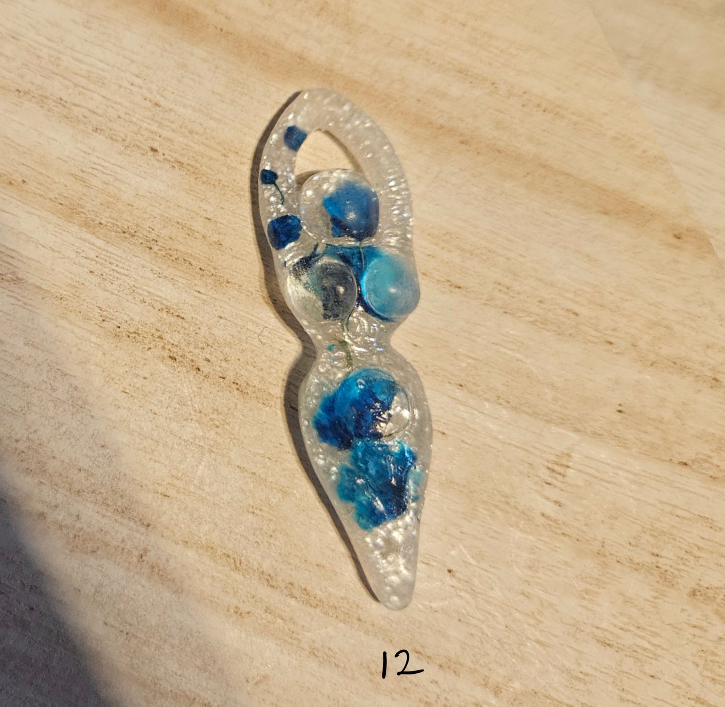 Tiny goddess figurine