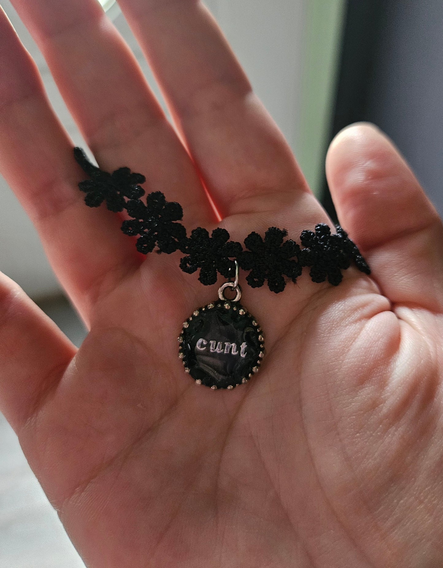 “Cunt” necklace choker