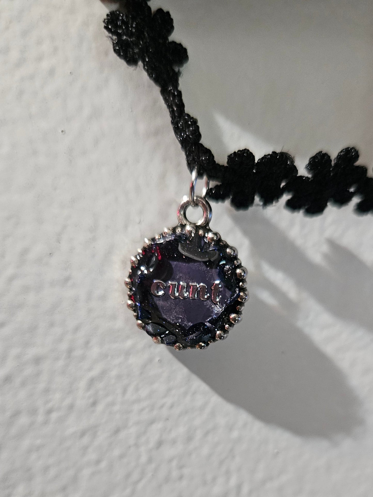 “Cunt” necklace choker
