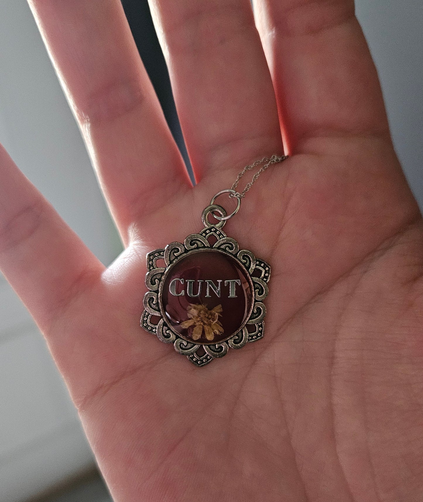 “Cunt” charm (pink flower)
