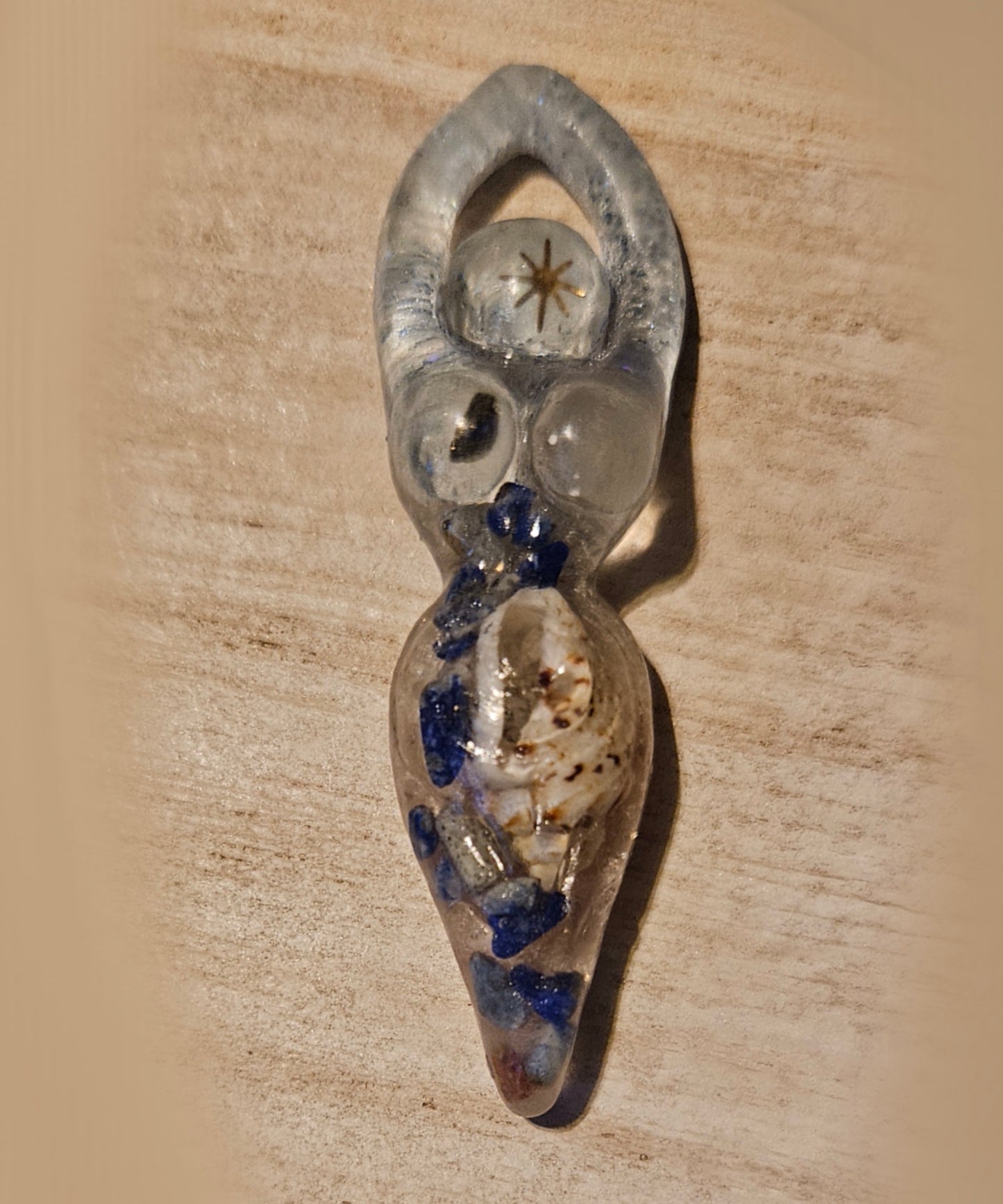Tiny goddess figurine