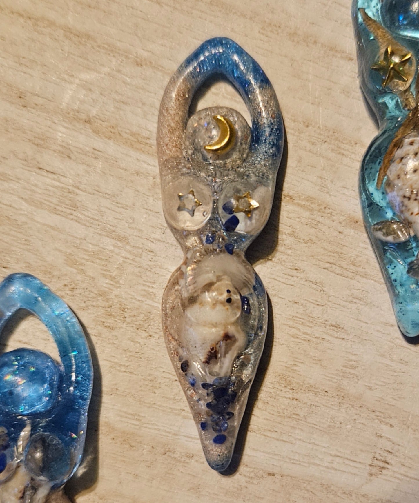 Tiny goddess figurine