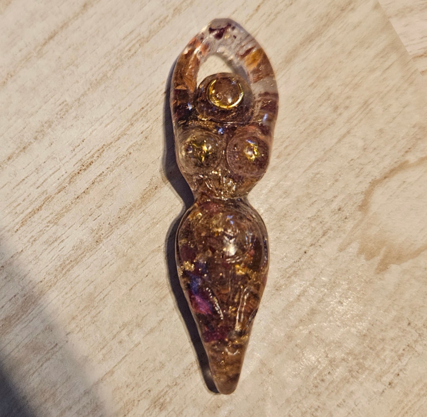 Tiny goddess figurine