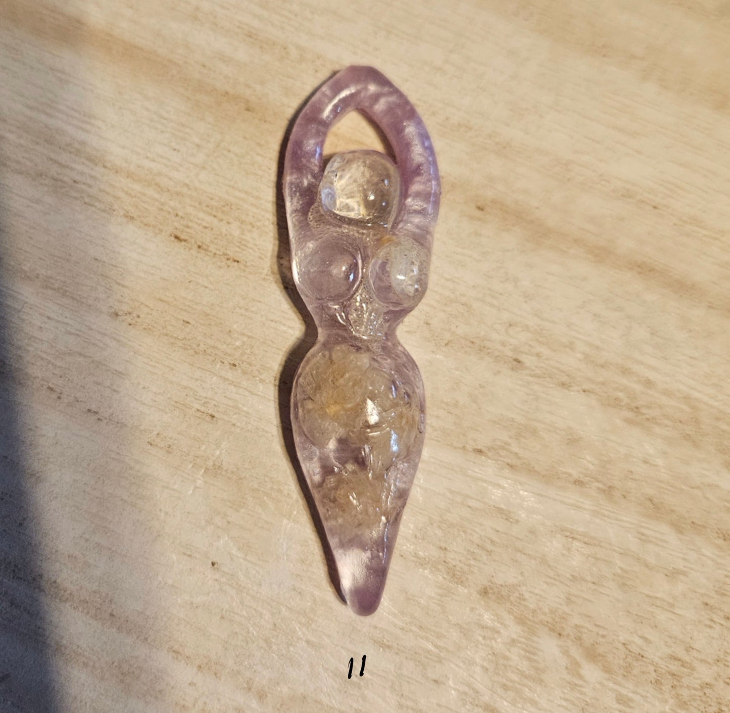 Tiny goddess figurine