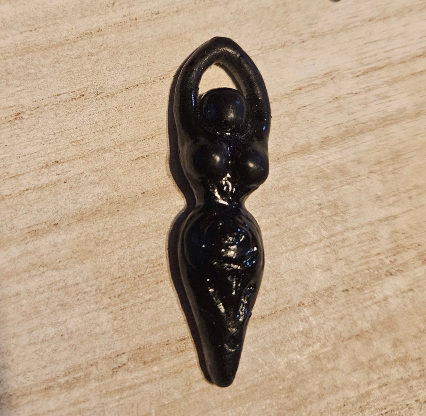 Tiny goddess figurine