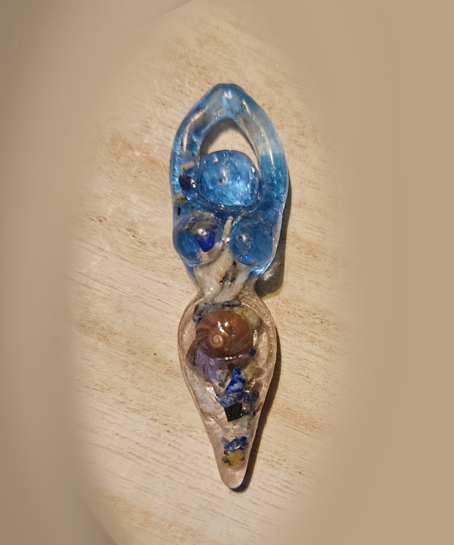 Tiny goddess figurine