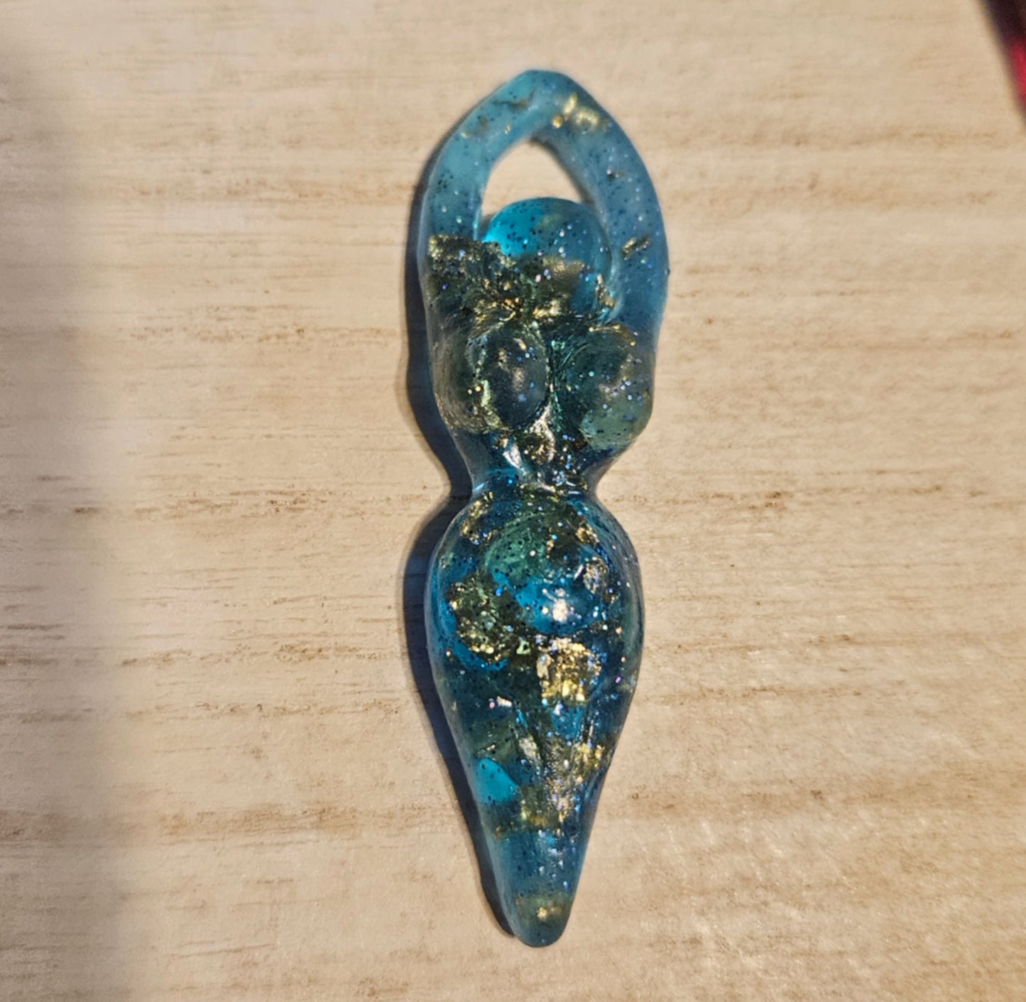 Tiny goddess figurine