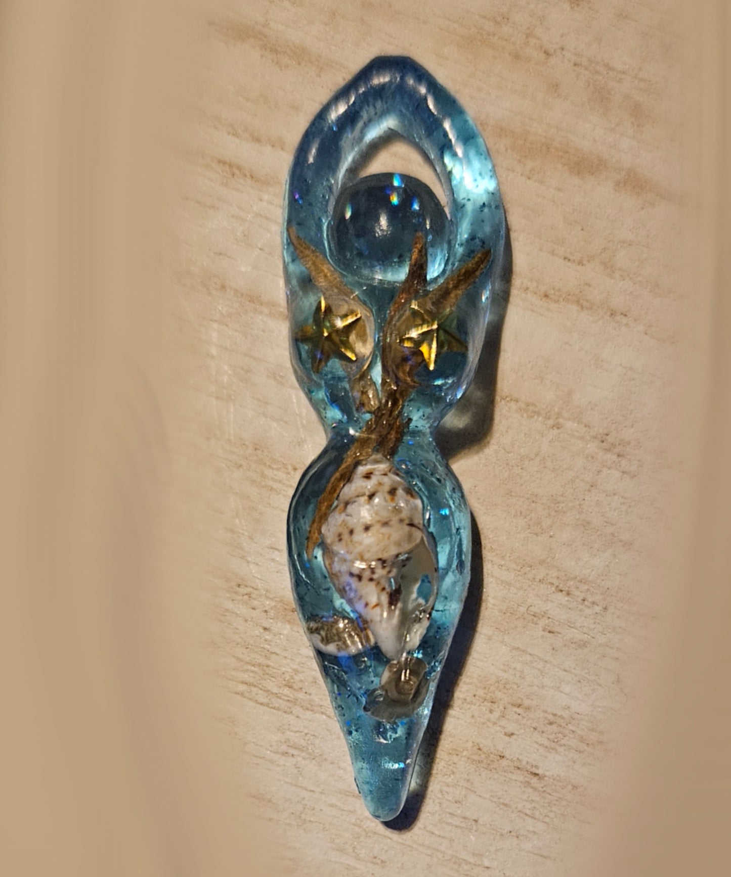 Tiny goddess figurine